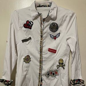 A beautiful white shirt that you can wear under a black jacket in winter